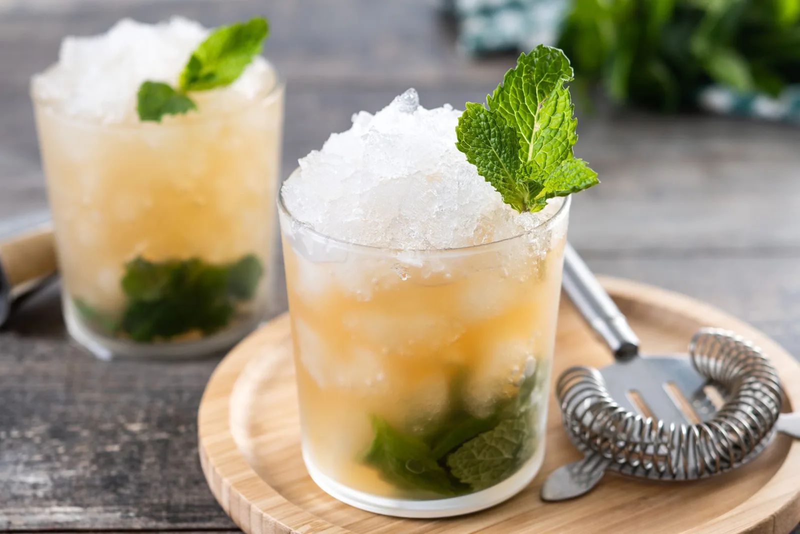 Classic Mint Julep Cocktail on wooden table